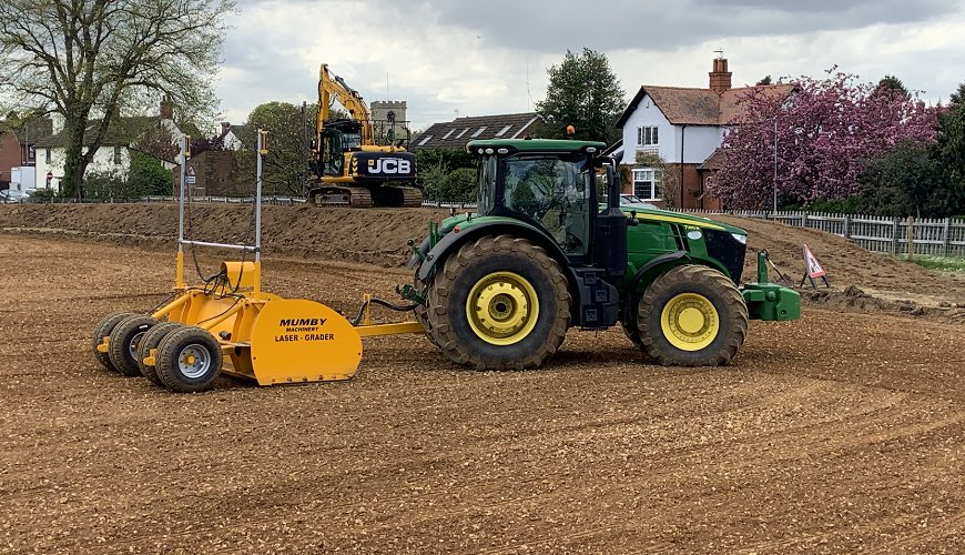 Laser grading football pitch surface